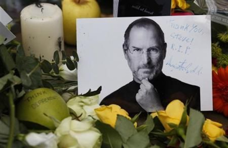 Tributes to the late Steve Jobs are left outside the Apple Store in London