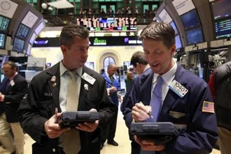 Traders work on the floor of the New York Stock Exchange