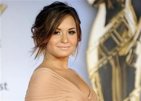 Actress and singer Demi Lovato arrives at the 2011 National Council of La Raza ALMA Awards in Santa Monica, California