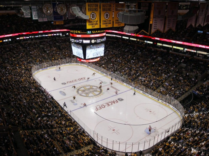 The Boston Bruins 2011 Stanley Cup Championship banner hangs from the rafters during their season opening NHL hockey game against the Philadelphia Flyers in Boston