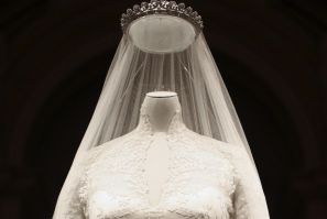  The wedding dress of Britain's Catherine, Duchess of Cambridge is seen as it is prepared for display at Buckingham Palace in London