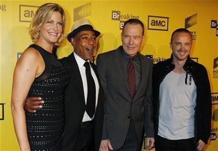 Cast members (L-R) Anna Gunn, Giancarlo Esposito, Bryan Cranston and Aaron Paul of AMC's drama television series 'Breaking Bad' pose as they arrive for the premiere screening for the show's fourth season in Hollywood, California