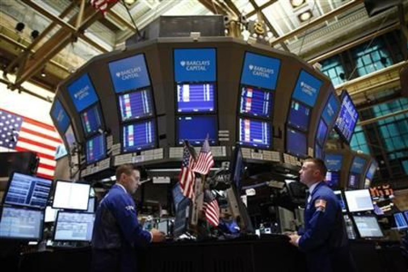 Traders work on the floor of the New York Stock Exchange