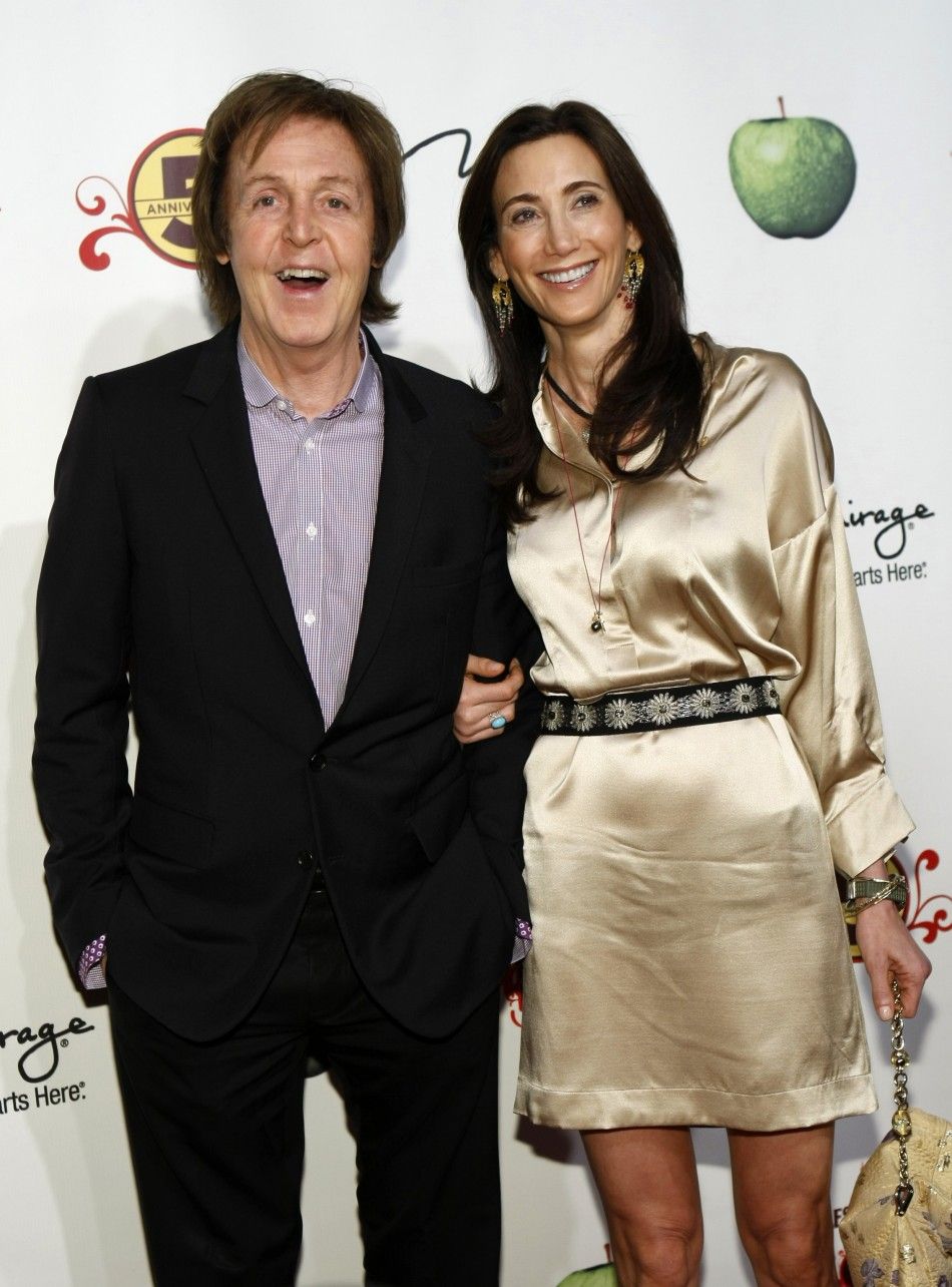 Paul McCartney L and Nancy Shevell pose as they arrive for the fifth anniversary celebration of quotThe Beatles LOVE by Cirque du Soleilquot show at the Mirage Hotel and Casino in Las Vegas, Nevada 