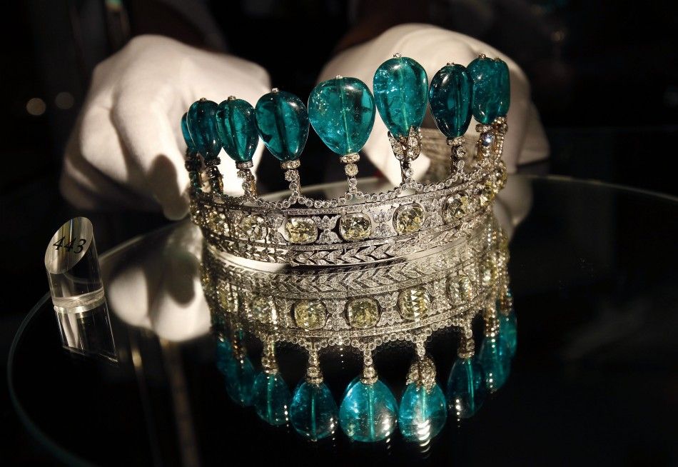An emerald and diamond tiara is displayed at Sothebys auction house in London