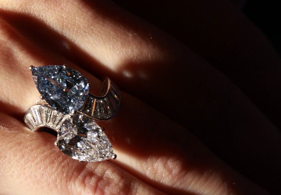 The Bulgari crossover ring set with 3.72 carat fancy vivid blue diamond and 3.93 carat diamond at Bonhams auction house in London