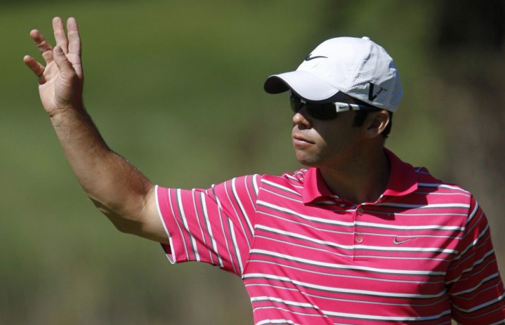 Paul Casey of Britain waves to the gallery after making birdie at the 18th hole during the second round of a PGA Tour golf tournament in San Martin