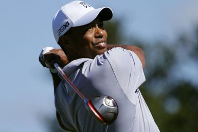 Tiger Woods hits his tee shot at the fourth hole during the second round of a PGA Tour golf tournament in San Martin