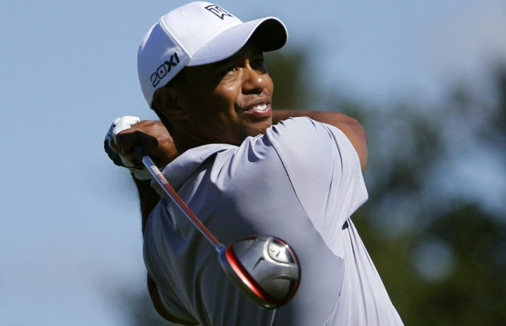 Tiger Woods hits his tee shot at the fourth hole during the second round of a PGA Tour golf tournament in San Martin