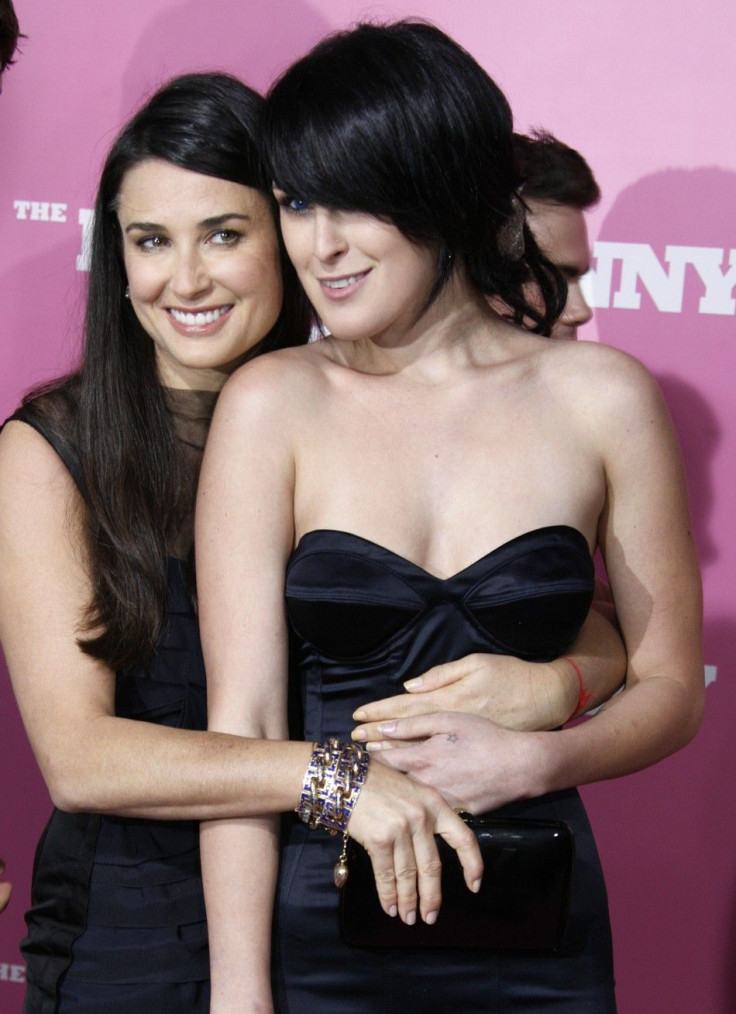 Rumer Willis (R), cast member of the comedy film &quot;The House Bunny&quot;, poses with her mother actress Demi Moore at the film's premiere in Los Angeles 