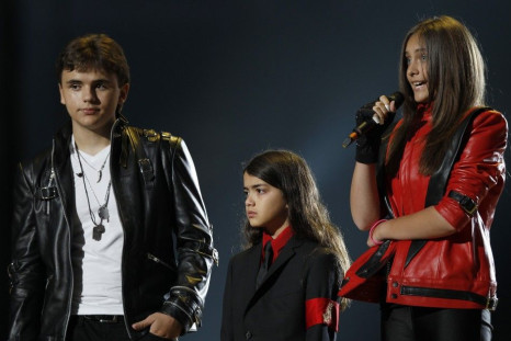 The children of late singer Michael Jackson, Prince Michael Joseph Jackson Jr., Prince Michael Jackson II (Blanket) and Paris-Michael Katherine Jackson (L-R) stand on stage during the &quot;Michael Forever&quot; tribute concert, which honours late pop ico