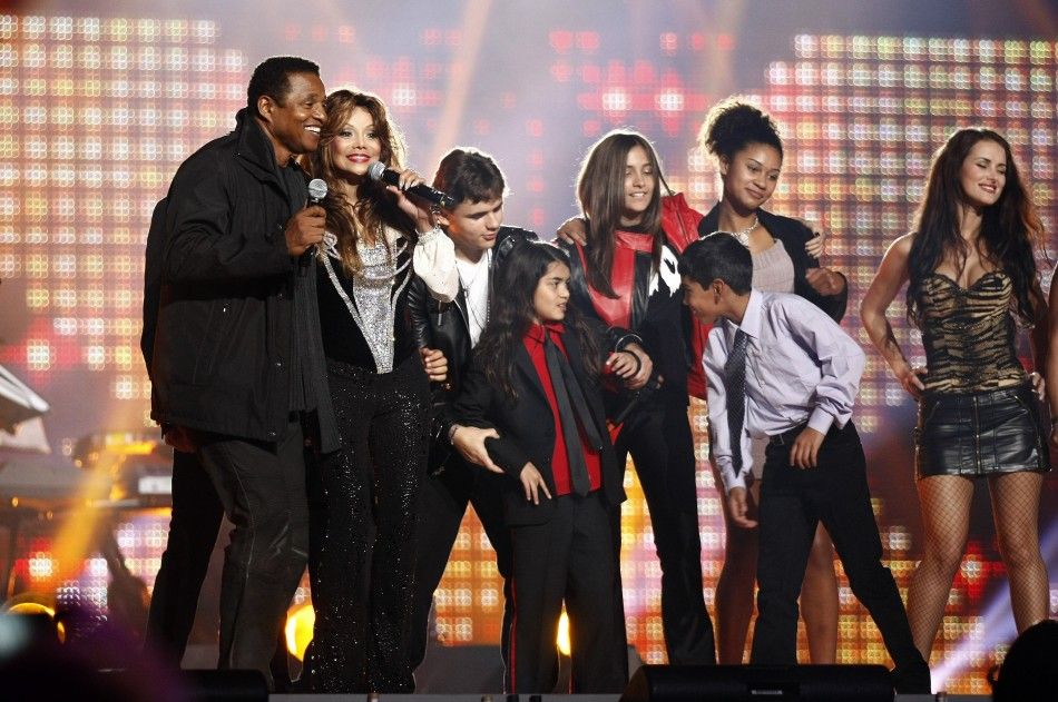 LaToya Jackson 2nd L, sister of the late pop star Michael Jackson, his children Prince Michael Joseph Jackson Jr. 3rd L, Prince Michael Jackson II Blanket and Paris-Michael Katherine Jackson 3rd R perform on stage during the quotMichael Forever