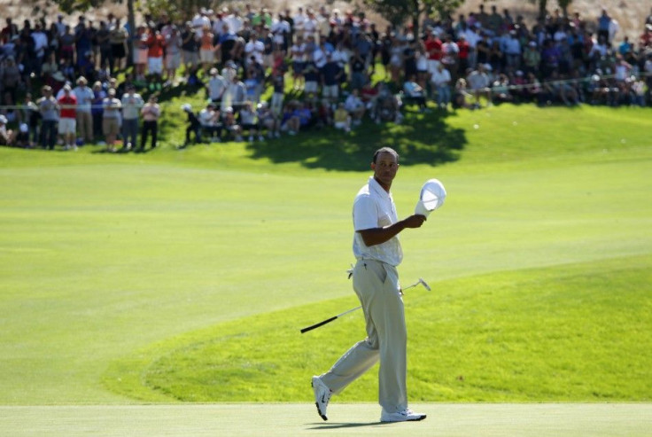 Tiger Woods of the U.S. walks off the ninth round after completing play during the third round of PGA Tour golf tournament in San Martin