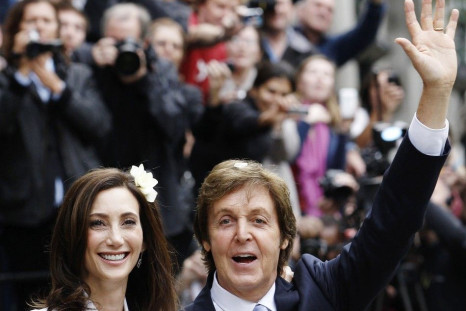 Singer Paul McCartney and his bride Nancy Shevell leave after their marriage ceremony at Old Marylebone Town Hall in London 