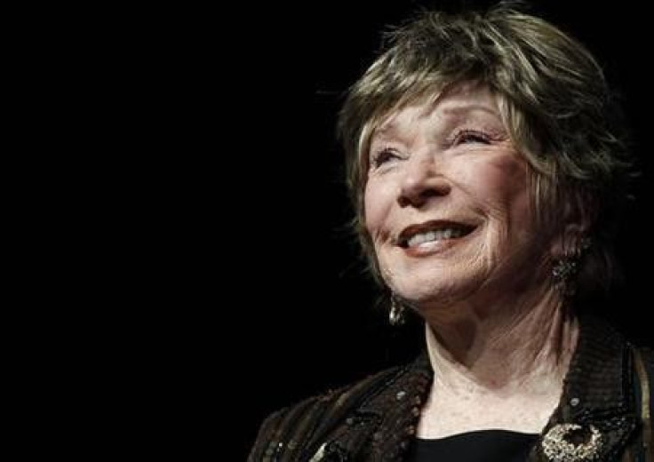 U.S. actress Shirley MacLaine reacts as the 37th American film festival of Deauville pays tribute to her career, in Deauville