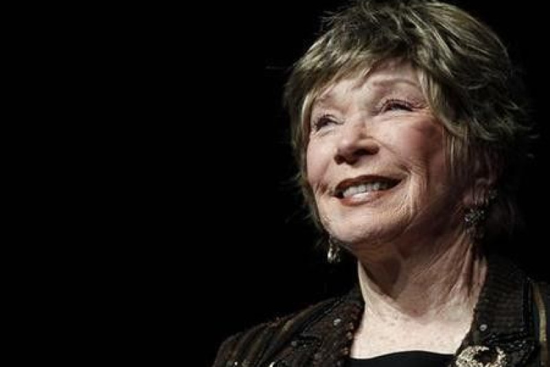 U.S. actress Shirley MacLaine reacts as the 37th American film festival of Deauville pays tribute to her career, in Deauville