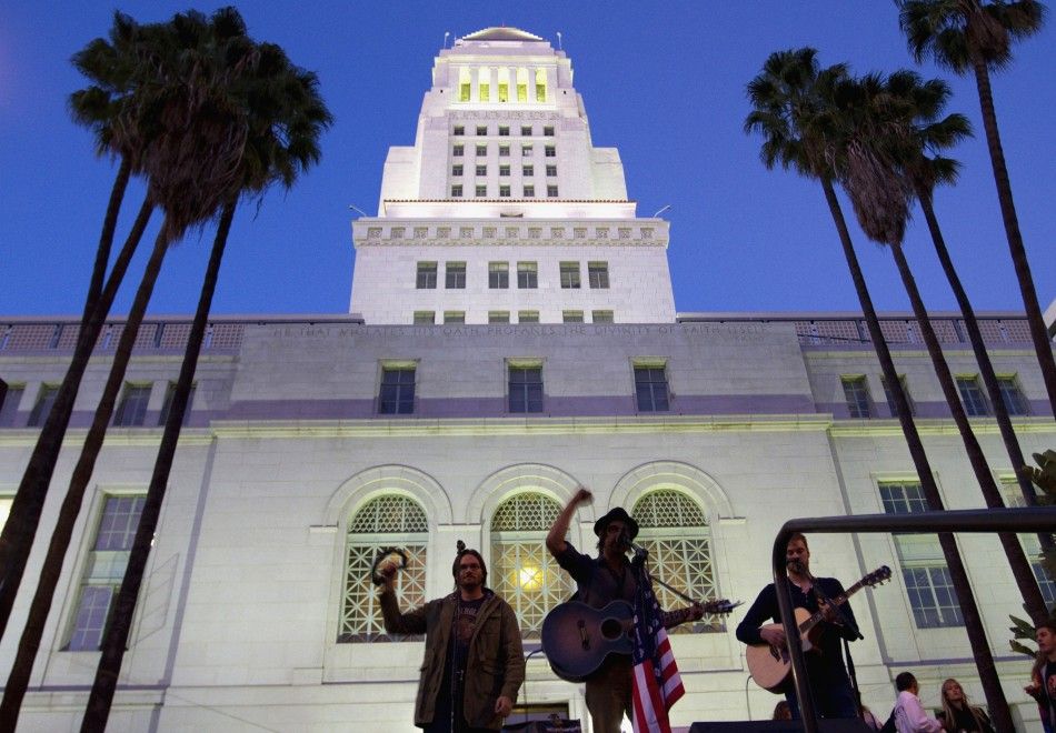 Musicians perform on the steps of Los Angeles City Hall during the Occupy LA protest