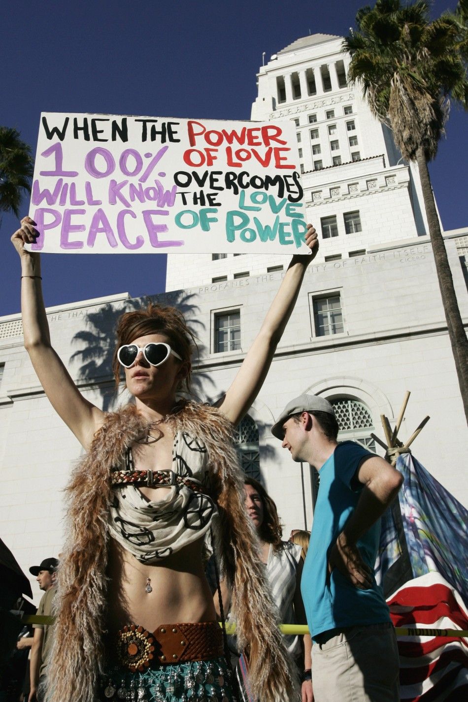 Jessica O039Donnell holds a sign at the Occupy LA protest on the lawn in front of Los Angeles City Hall