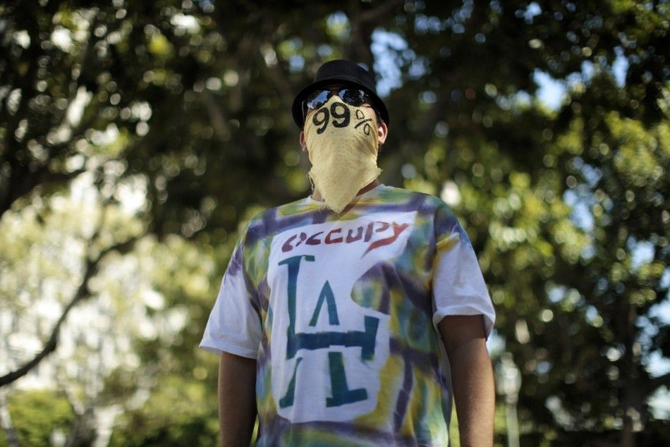A man wears an Occupy LA t-shirt at their protest camp in Los Angeles, California