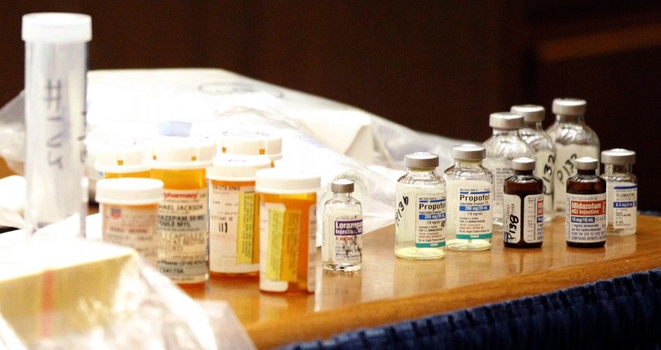 Drugs found in the home of pop star Michael Jackson sit on the prosecutions table after being introduced as evidence during Dr. Conrad Murrays trial in Los Angeles