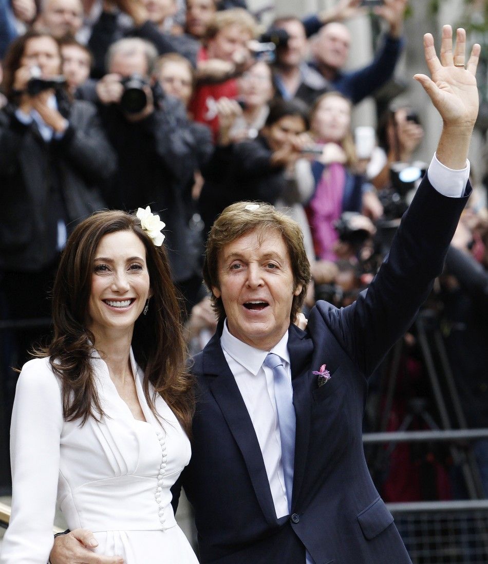 Singer Paul McCartney and his bride Nancy Shevell leave after their marriage ceremony at Old Marylebone Town Hall in London