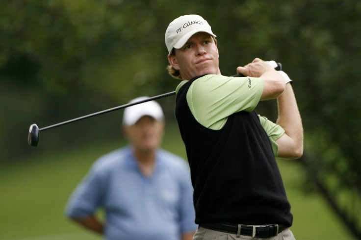 Golfer Briny Baird tees off during the first round of "The Barclays," the first of four PGA tour Playoffs for the FedEx Cup, at the Westchester Country Club in Rye, New York