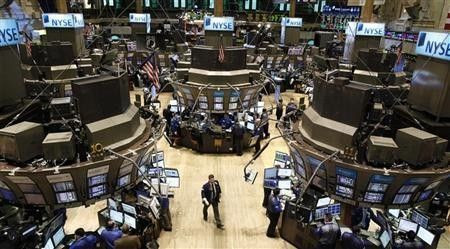 Traders work on the floor of the New York Stock Exchange
