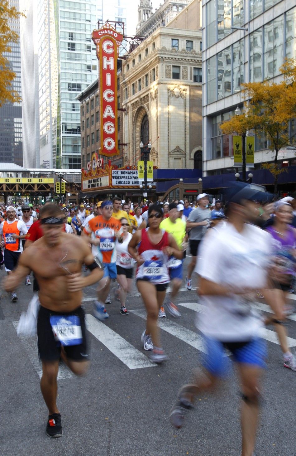 Runners participate in the Chicago Marathon