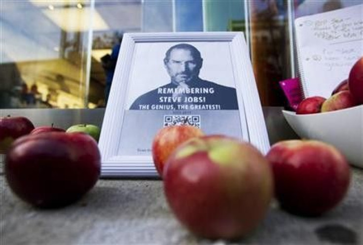 A tribute to Apple Inc., co-founder and former CEO Steve Jobs is left in front of an Apple store in downtown Montreal