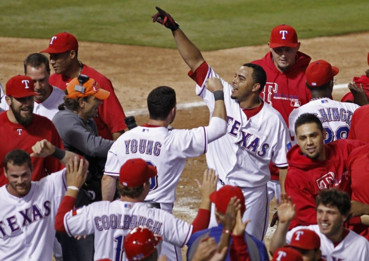 Texas Rangers&#039; Cruz celebrates his grand slam home run against the Detroit Tigers in the eleventh inning in Game 2 of their MLB American League Championship Series baseball playoffs in Arlington
