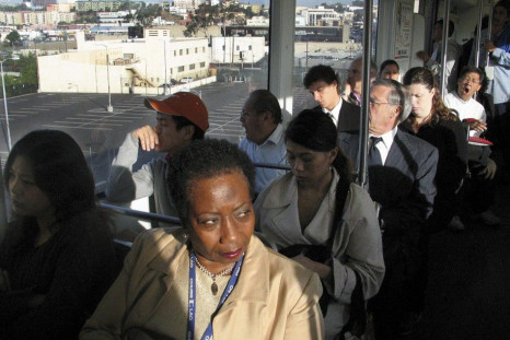 Commuters ride a Los Angeles Metro Gold Line train to Los Angeles