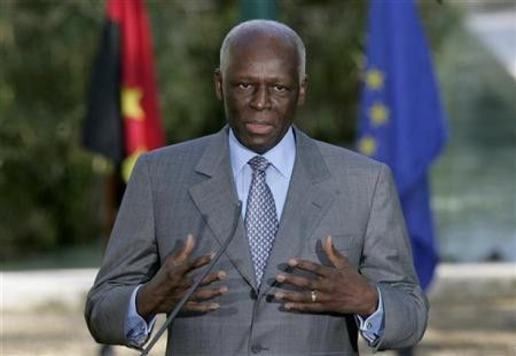 Angola's President Jose Eduardo dos Santos talks to journalists after a signature agreement ceremony held at Sao Bento Palace in Lisbon, Portugal
