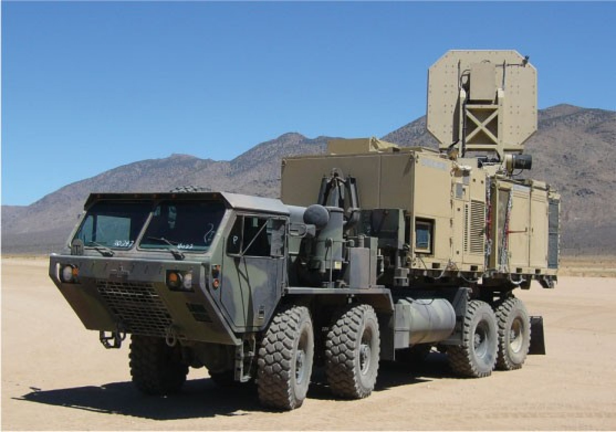 An active denial system mounted atop a military vehicle