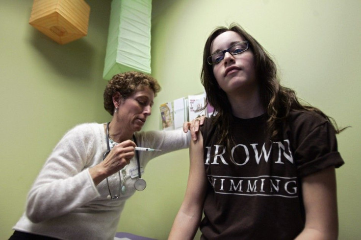 Teenage patient receiving HPV vaccine.