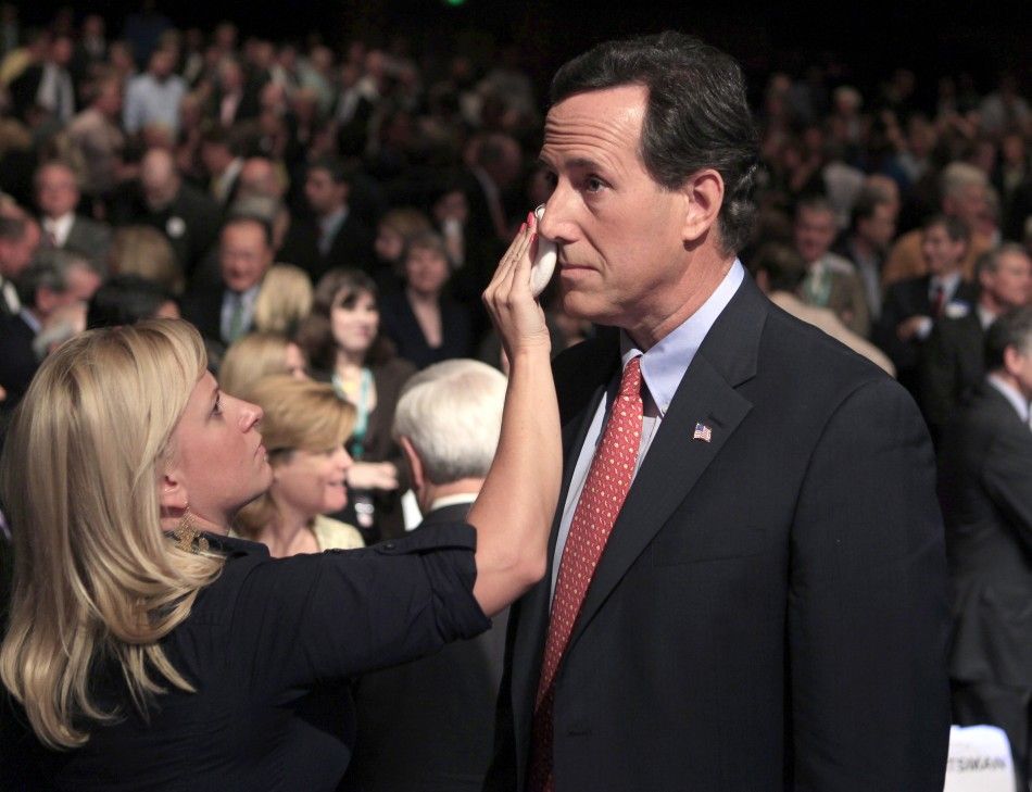 Former Pennslyvania Senator Rick Santorum R-PA has his make up touched up the Republican presidential debate at Dartmouth College in Hanover, New Hampshire 
