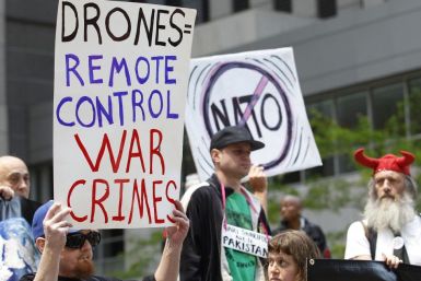 Peace activists take part in anti-NATO demonstration outside of Obama&#039;s campaign headquarters in Chicago