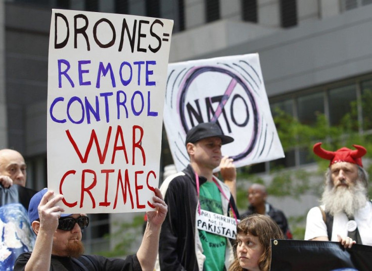 Peace activists take part in anti-NATO demonstration outside of Obama's campaign headquarters in Chicago