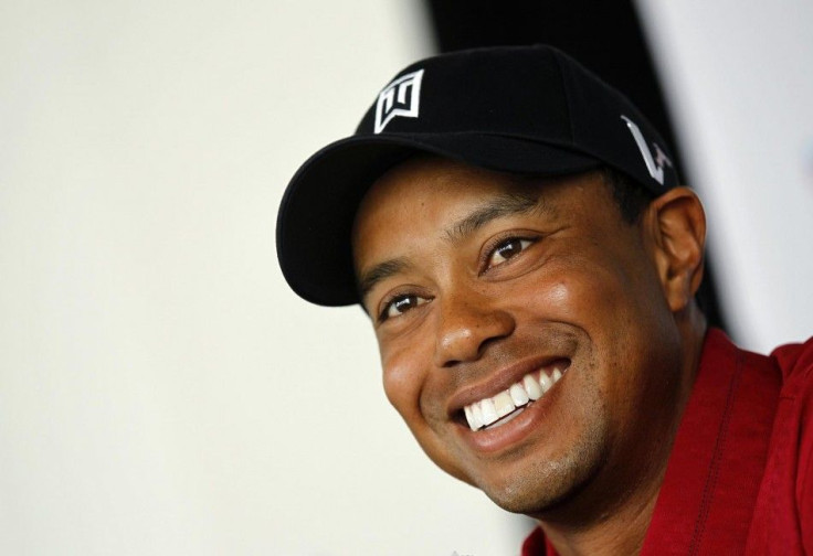 Tiger Woods answers questions at a news conference ahead of the 2011 Chevron World Challenge golf tournament in Hollywood.