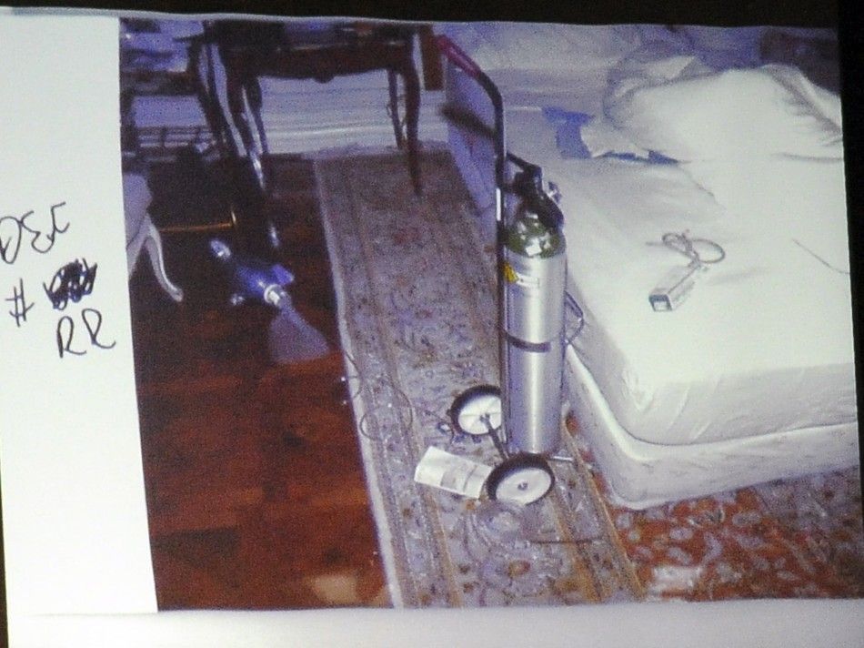 A photograph of Michael Jacksons bedroom is projected as Defense attorney Ed Chernoff cross examines LAPD Det. Scott Smith during Dr. Conrad Murrays trial in the death of pop star Michael Jackson in Los Angeles, California