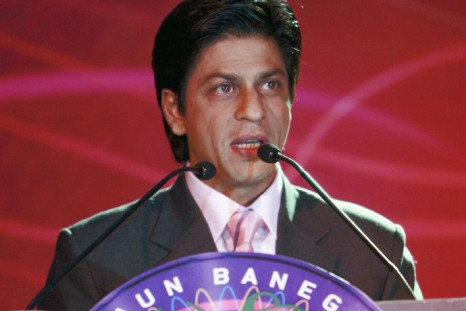 Bollywood actor Shah Rukh Khan speaks at a news conference in New Delhi December 4, 2006. 