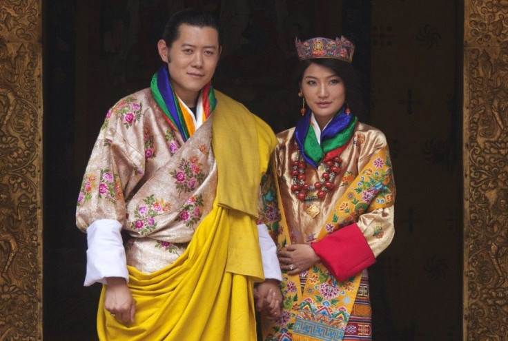 King Jigme Khesar Namgyel Wangchuck and Queen Jetsun Pema pose for pictures after their marriage at the Punkaha Dzong in Bhutan's ancient capital Punakha