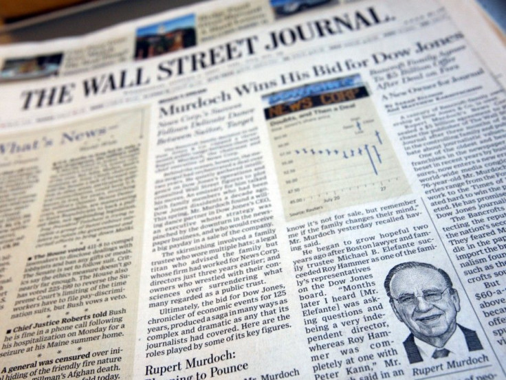 A photograph of the front page of the August 1, 2007 edition of the Wall Street Journal reports that Rupert Murdoch's News Corp will purchase Dow Jones & Co for some $5 billion.