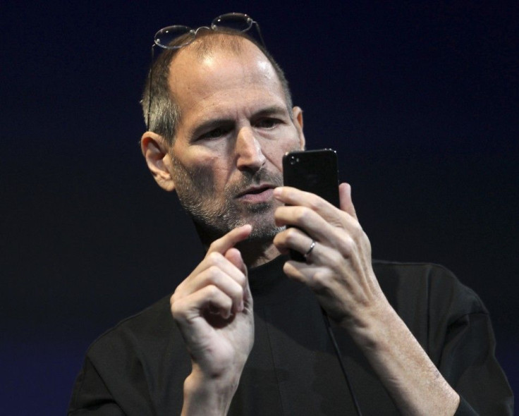 Apple CEO Steve Jobs demonstrates the new iPhone 4 during his appearance at the Apple Worldwide Developers Conference in San Francisco
