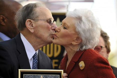 Legendary songwriter Hal David (L) receives a kiss from wife Eunice as the Hollywood Chamber of Commerce honors him with a star on the Hollywood Walk of Fame in Los Angeles, California