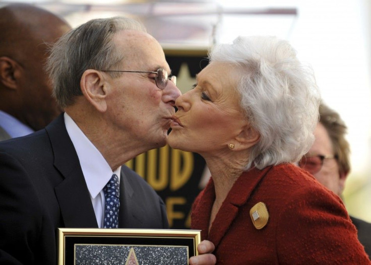 Legendary songwriter Hal David (L) receives a kiss from wife Eunice as the Hollywood Chamber of Commerce honors him with a star on the Hollywood Walk of Fame in Los Angeles, California
