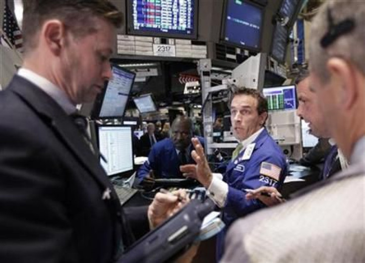 Traders work on the floor of the New York Stock Exchange