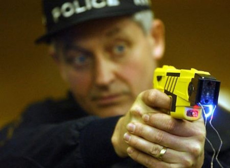 Police demonstrating a Taser gun