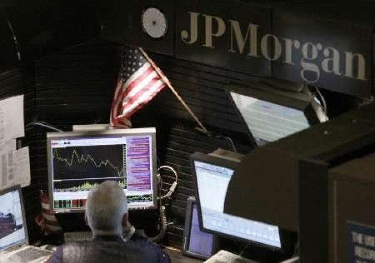 A trader works in the J.P. Morgan stall on floor of the New York Stock Exchange, September 14, 2009. 