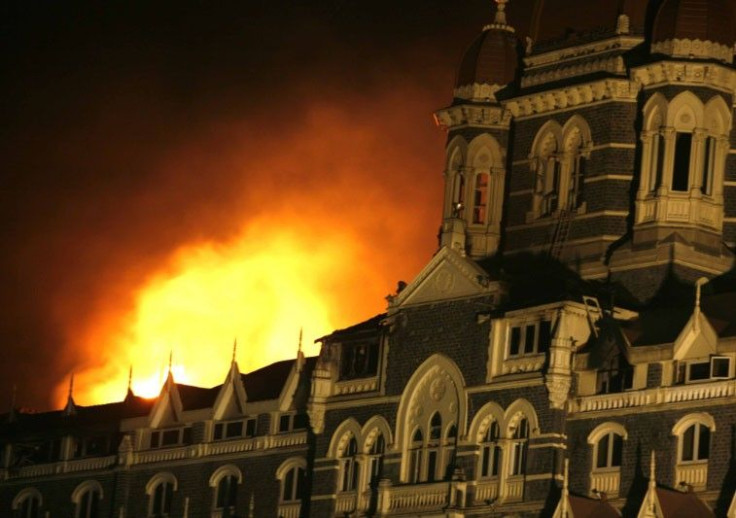 Smoke and fire billows out of the Taj Hotel in Mumbai November 27, 2008