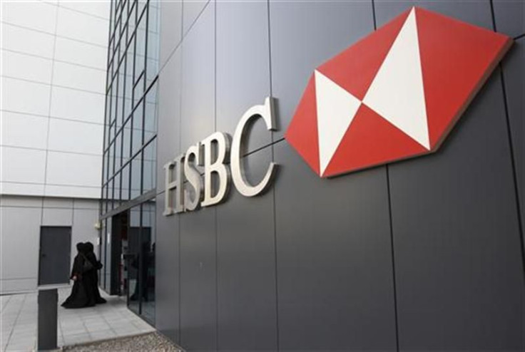 Women walk out of a branch of HSBC at Dubai Internet City in Dubai